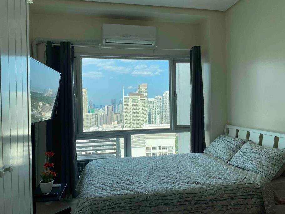 Makati Penthouse With Stunning City Skyline View 马尼拉 外观 照片